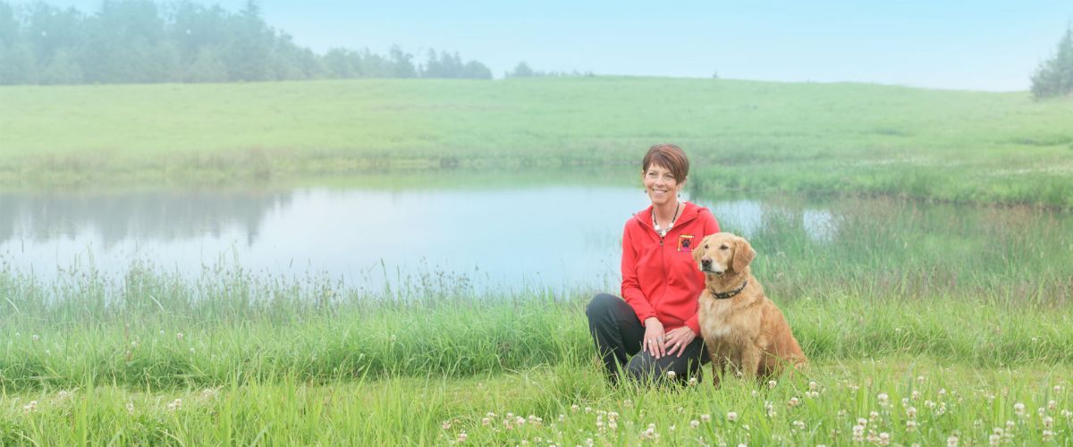 Janice Gunn with obedience trial winining retriever pounce TNT